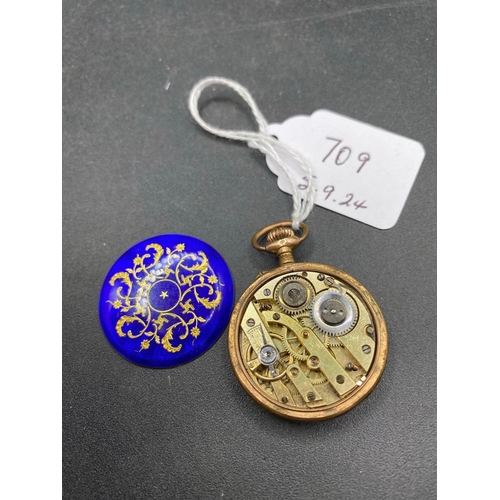 709 - An attractive enamel fob watch with decorative back