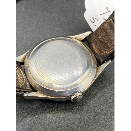 725 - A Longines wrist watch with seconds sweep