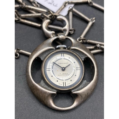 736 - A Corocraft pendant watch with metal long link albert chain