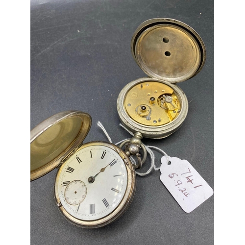 741 - A gents silver pocket watch and a metal example