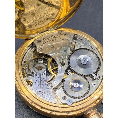 742 - A rolled gold Waltham pocket watch on leather Albert