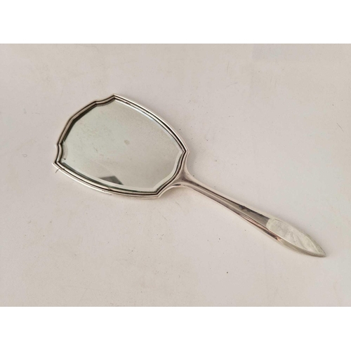 797 - A silver and Tortoise shell inset hand mirror with bevelled plate, London 1930