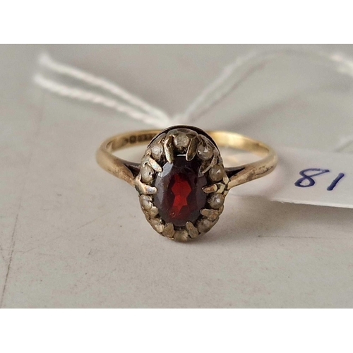 81 - A red and white stone cluster ring 9ct size O 2.3 gms