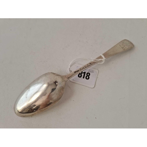 818 - A George III table spoon, London 1773 with crest, 65g