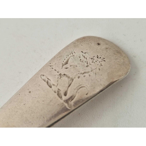 818 - A George III table spoon, London 1773 with crest, 65g