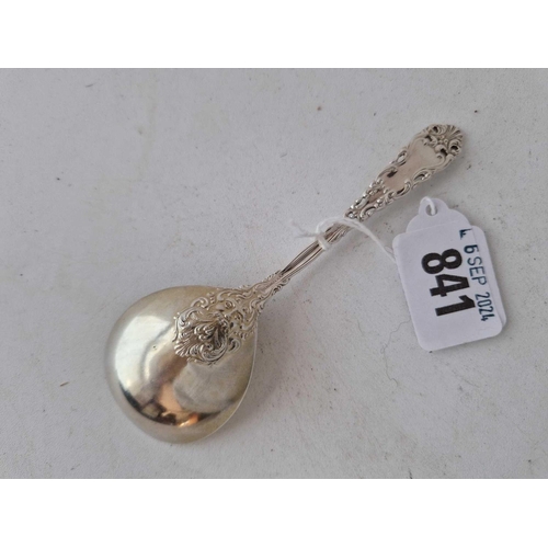 841 - A sterling silver caddy spoon, pierced stem, gilt bowl