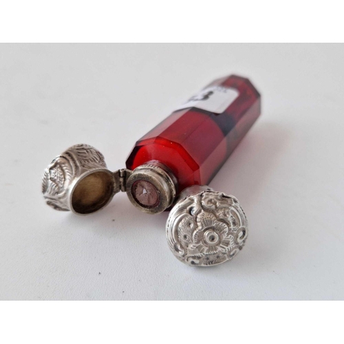 853 - A red glass mounted scent bottle with silver ends, 4