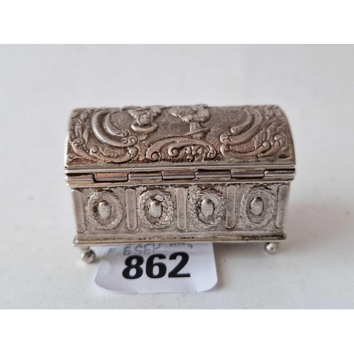 862 - A Dutch style casket with hinged dome cover with chased decoration, 2.5