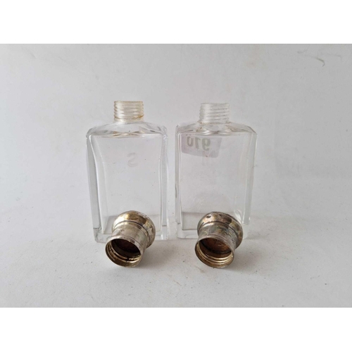 910 - A pair of Cologne bottles with glass bodies, 4.5