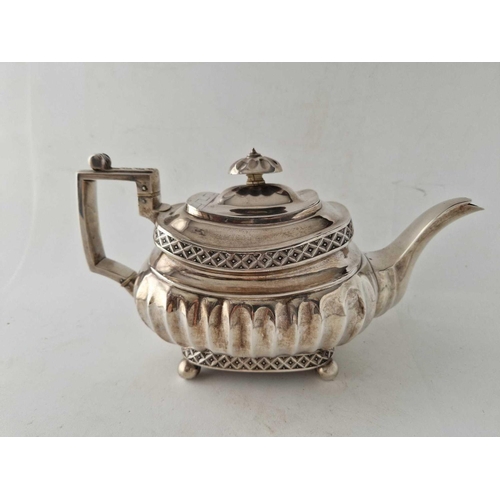 930 - A good Exeter George III tea pot with ribbed body and criss-cross bands, 1813 by W Woodman, 685g