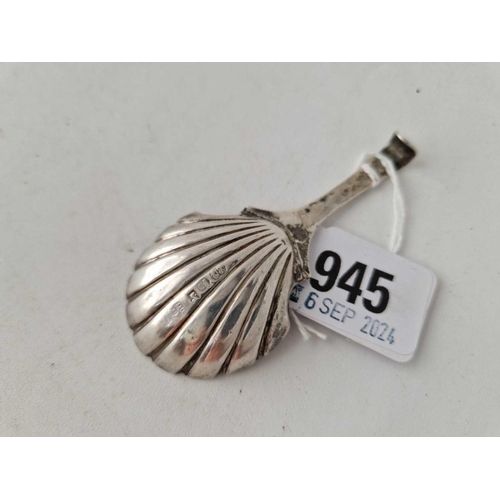 945 - A Georgian caddy spoon with shell shaped bowl, Sheffield 1830, by IT DH?