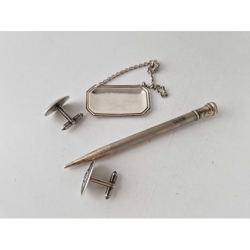 96 - A silver wine ticket pencil and a pair of cufflinks