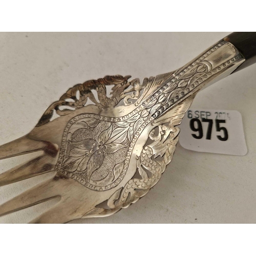 975 - An eastern silver serving fork, 8 inches long