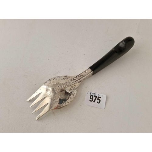 975 - An eastern silver serving fork, 8 inches long