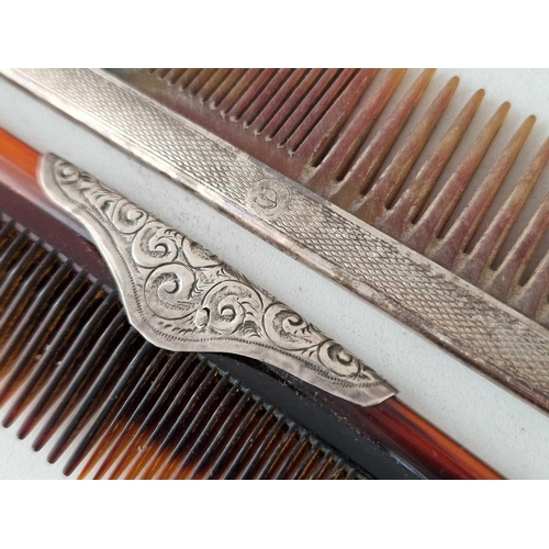 985 - Two silver mounted combs