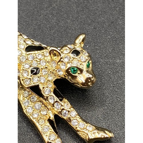 234 - 'Cartier Style' Enamelled Brooch and Gem Set Leopard with Green Gem Set Eyes