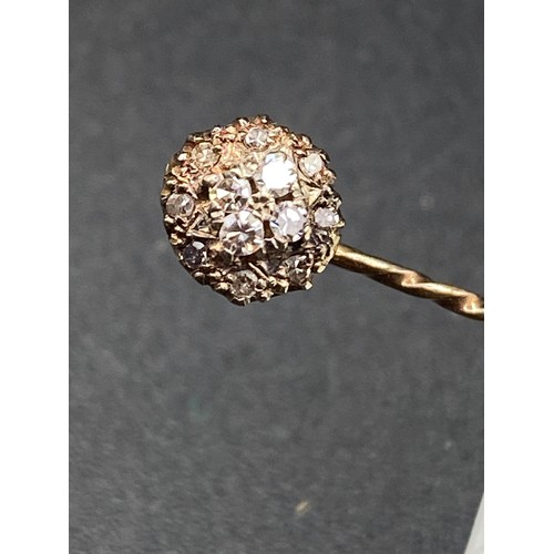 236 - An antique bright diamond stick pin in Round Circle fancy mount