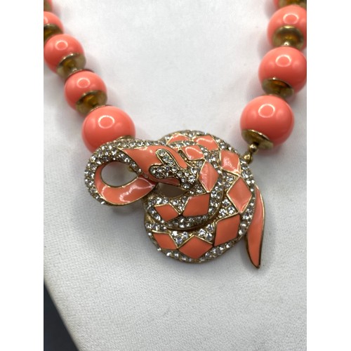 238 - A fancy coral coloured and gem stone designer snake necklace 17