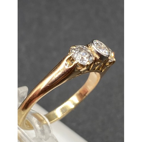 240 - A VERY BRIGHT THREE STONE DIAMOND RING, 18ct Size K