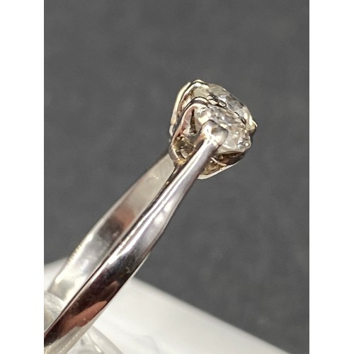 311 - A WHITE GOLD THREE STONE DIAMOND RING, 18ct, size L