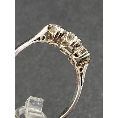 311 - A WHITE GOLD THREE STONE DIAMOND RING, 18ct, size L