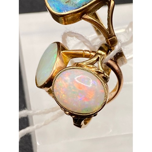 313 - Three gold set opal/ doublet rings, size O, N and E