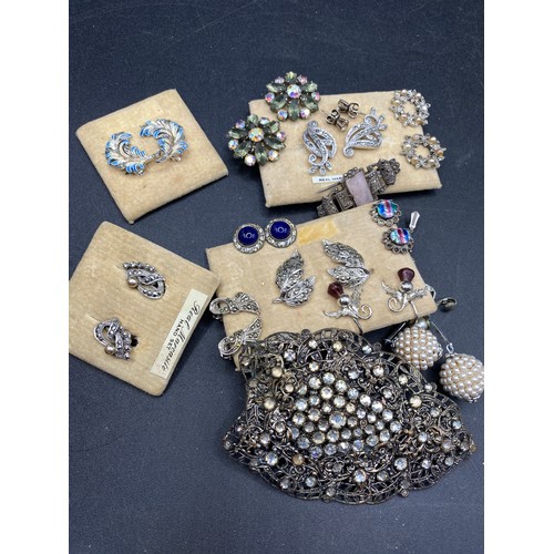 503 - A box of assorted marcasite earrings brooch etc.