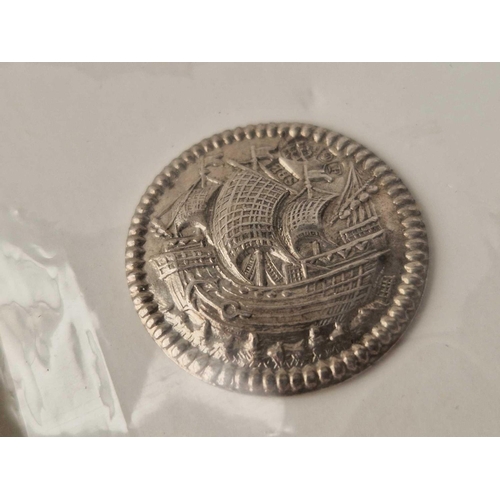 Twelve Chester silver buttons embossed with galleons