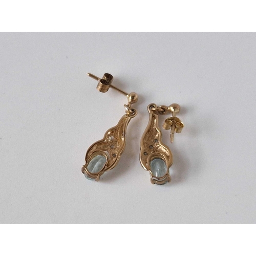 103 - A pair of diamond and topaz drop earrings 9ct 1.6 gms