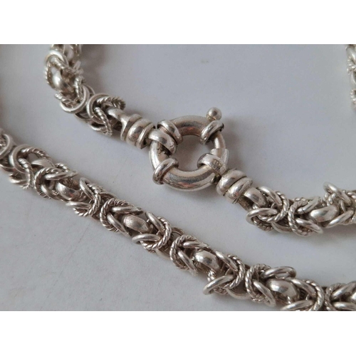 108 - A silver fancy link neck chain 16 inch with matching earrings 62 gms