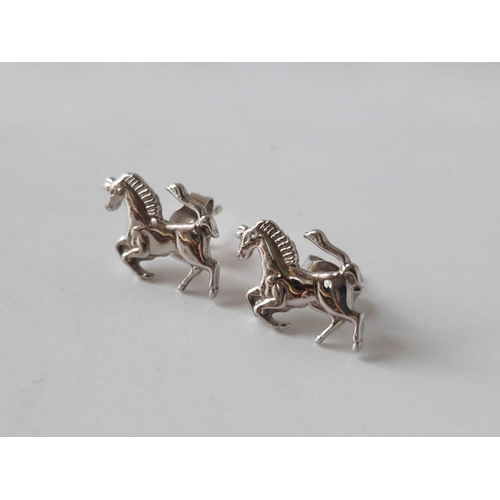 110 - A pair of white gold horse earrings 9ct 3.2 gms