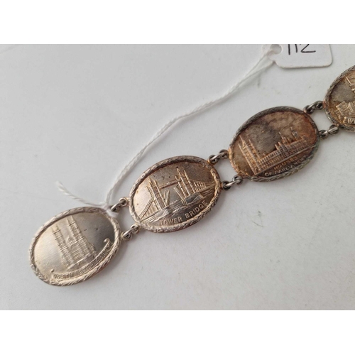 112 - A silver five panel bracelet depicting veracious land marks 33 gms