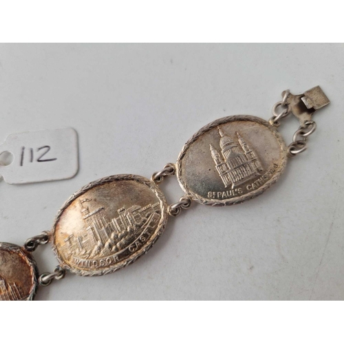 112 - A silver five panel bracelet depicting veracious land marks 33 gms