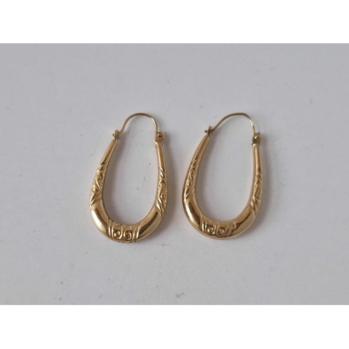 133 - A pair of 9ct hoop earrings