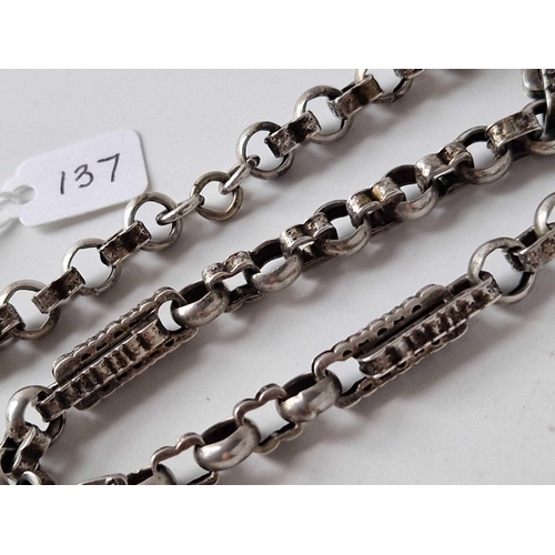 137 - A antique fancy silver albert chain 27 gms