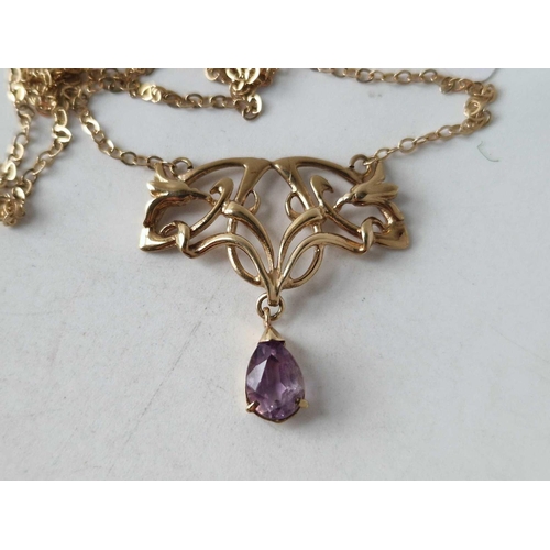 138 - A art nouveau design necklet with drop shaped amethyst 9ct