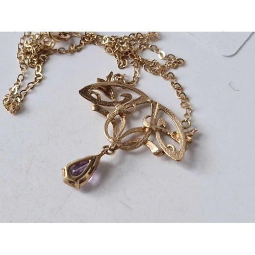 138 - A art nouveau design necklet with drop shaped amethyst 9ct