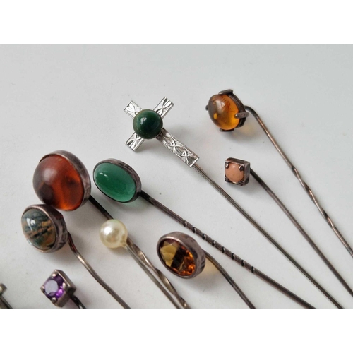 145 - Selection of 10 stickpins one a cross with green gem coral amethyst and a miniature dagger with moth... 