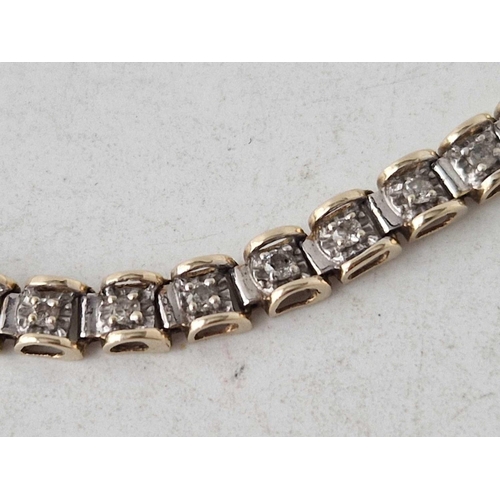 151 - A DIAMOND LINE BRACELET WITH BRILLIANT CUT DIAMONDS ALMOST 1 CARAT 9CT 7 INCH 7.8 GMS