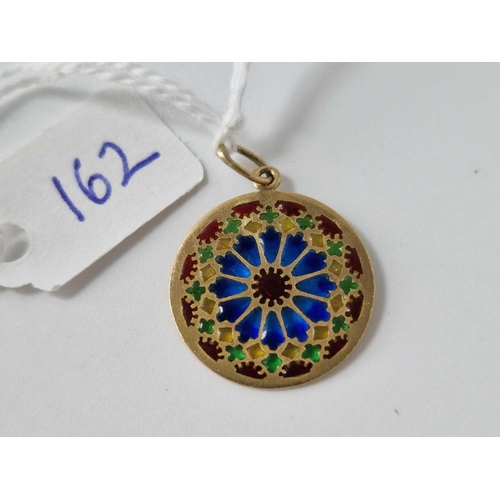 162 - A gold and enamel circle pendant 18ct gold 1.5 gms