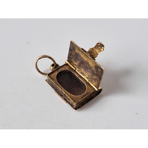 192 - A small antique gold book locket