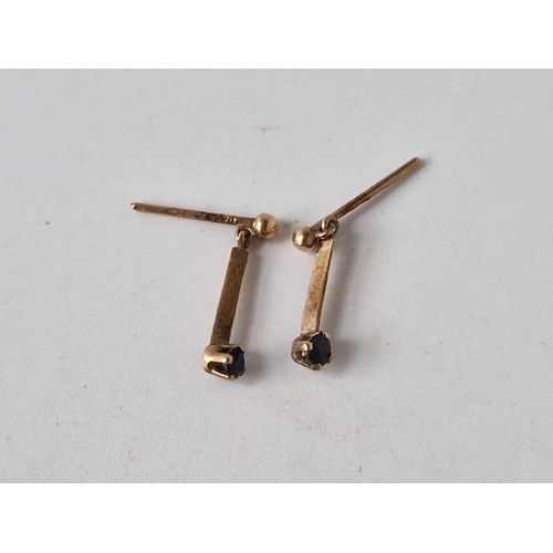 199 - A pair of gold and sapphire earrings