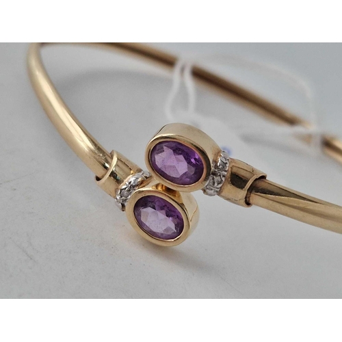 213 - A amethyst torque bangle 9ct 6.8 gms