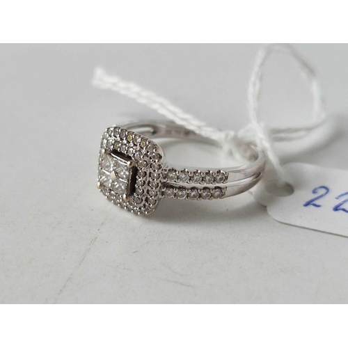 223 - A WHITE GOLD MULTI DIAMOND SET RING SIZE R 5.6 GMS