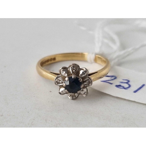 231 - A sapphire and diamond flower head ring 9ct size M 3.1 gms