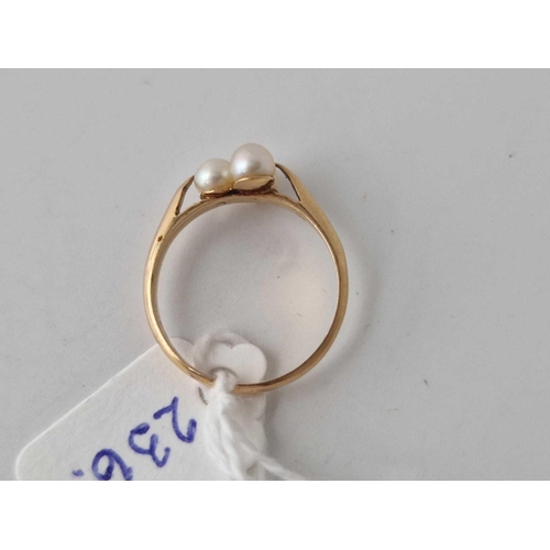 236 - A three stone pearl ring 9ct size N 2 gms