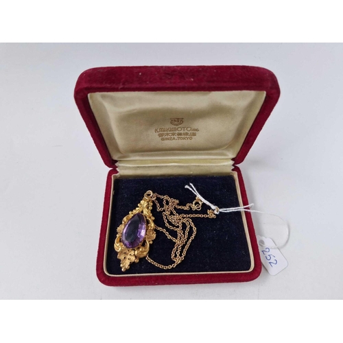 252 - A VICTORIAN HIGH CARAT AMETHYST PENDANT ON 9CT GOLD CHAIN 16.5 INCH BOXED