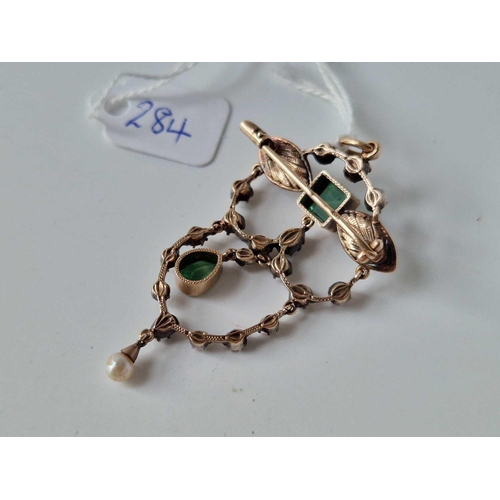 284 - A ANTIQUE GOLD AND SILVER SET BROOCH PENDANT WITH DIAMONDS AND EMERALDS