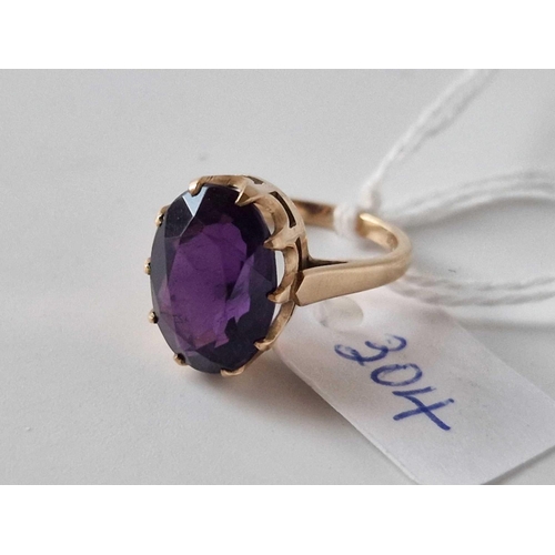 304 - A large amethyst cocktail ring 9ct size M 4 gms