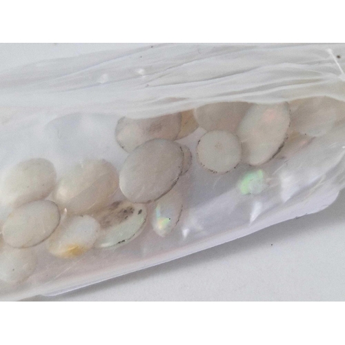 46 - A variety of opal gemstones many oval approx 18 carats